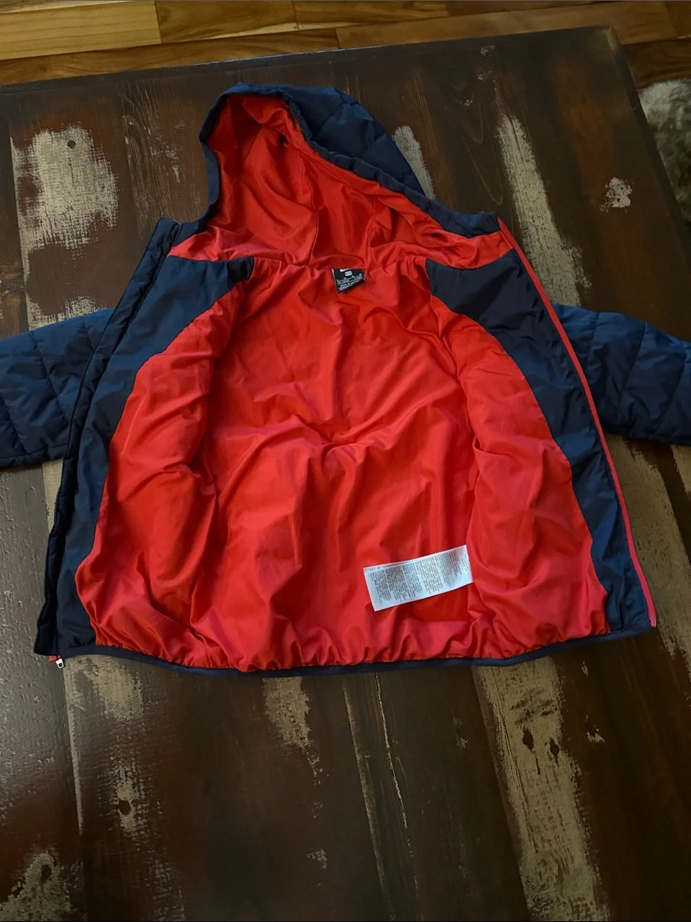 Nike Kids Navy Puffer Jacket with Red Trim and Hood Lining